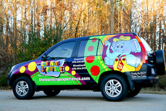 Post image for company mascot hitches a ride on SUV wrap