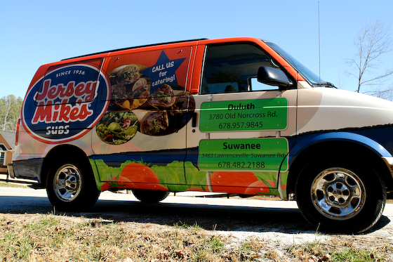 Thumbnail image for food industry van wrap shares multiple locations and catering options